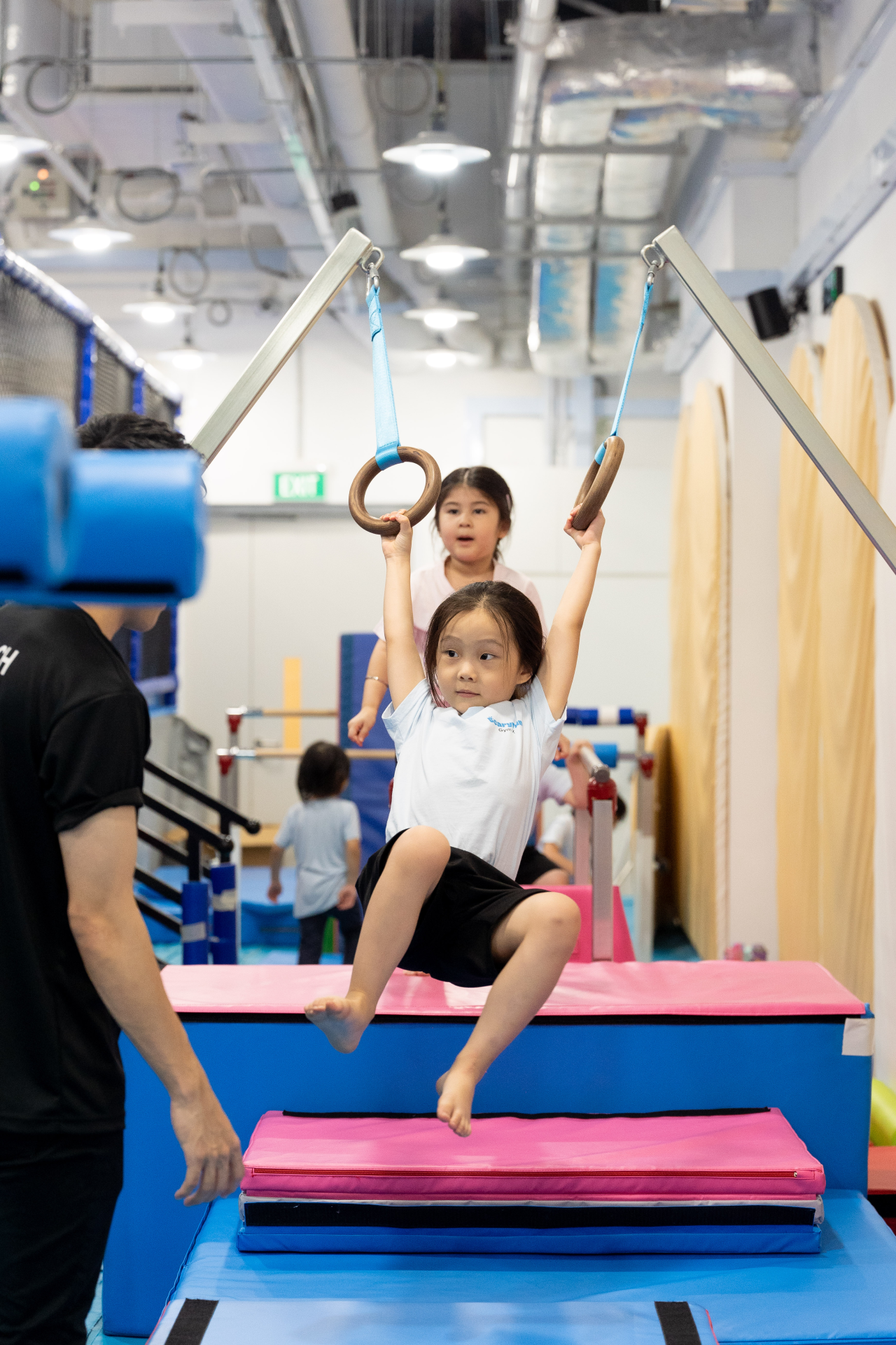 A young kid attending gym classes